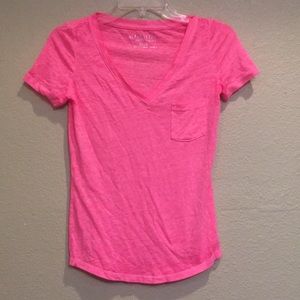 pink  v neck shirt